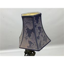 French figural spelter lamp modelled as a lady upon turned stepped circular base with blue fabric shade, H76cm