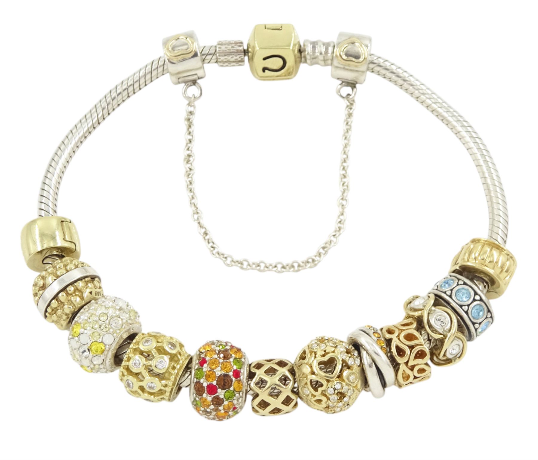 Chamilia 14ct gold and silver charm bracelet, silver bracelet, with 14ct gold and silver finials, six 14ct gold charms including cubic zirconia, four silver charms and two silver and 14ctgold charms, boxed