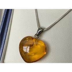 Silver Baltic amber jewellery, comprising two pendants, bracelet and pair of pendant earrings, together with pair of silver turquoise earrings, silver stone set pendant necklace and a gold plated bangle