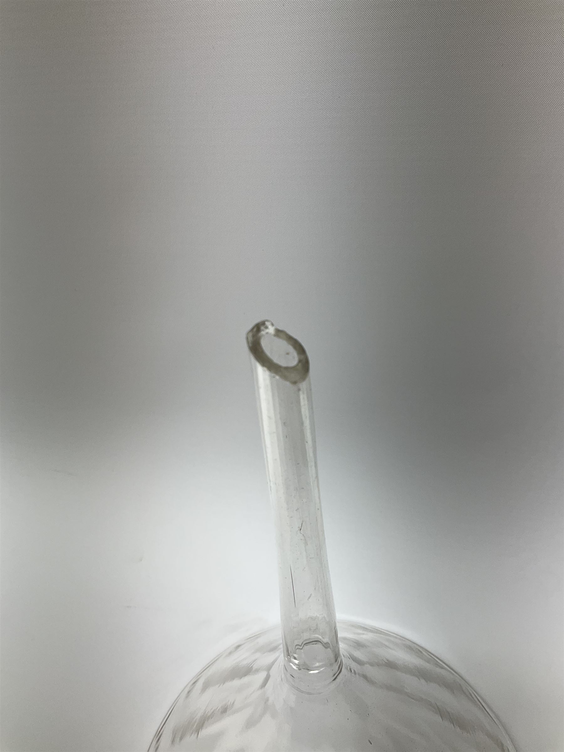 Collection of 19th century and later pharmaceutical laboratory glass, to include, large filter funnel, graham condenser, conical flask, bell jar and another with graduated tube, Provenance: discovered in the storeroom of a long established Hull pharmacist and opticians