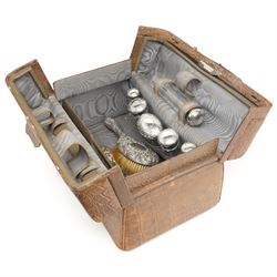 Ladies Edwardian crocodile travelling toilet case with watered silk interior containing si...