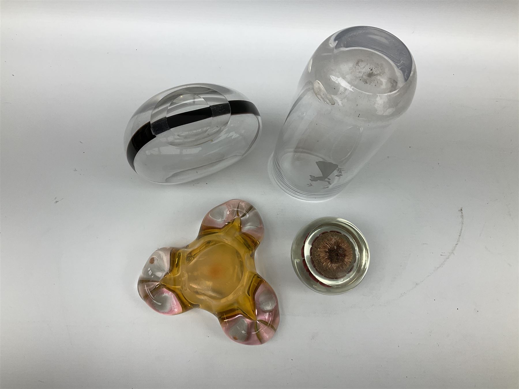 Vicke Lindstrand for Kosta glass vase of flattened ovoid form, the body with deep purple band from rim to rim, signed LH 1242 beneath, together with Orrefors glass vase, engraved with female figure with birds, signed beneath, art glass bowl and paperweight (4) tallest H23.5cm