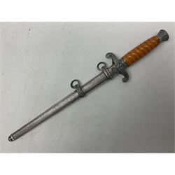 Late WW2 German Army Officers dress dagger, with unmarked 25cm double edged steel blade, orange celluloid grip, pommel and ferrule with oakleaves relief and cross guard with eagle; in original beaded scabbard with two hanging rings L39.5cm overall