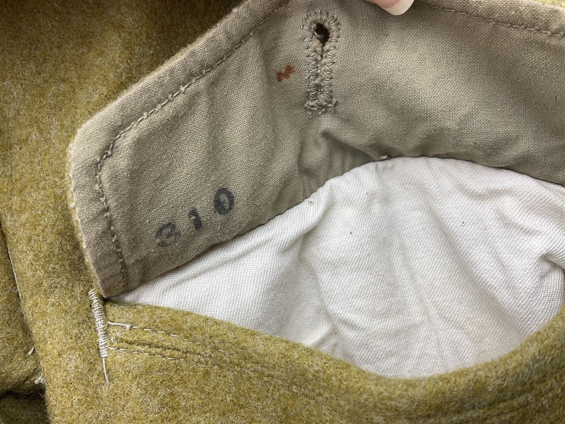 Japanese Type 38 winter tunic, the lining stamped with various Japanese character marks