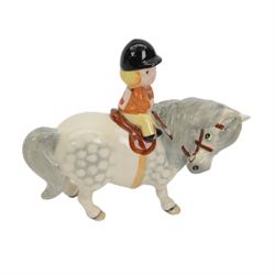 Two Beswick figures, comprising Boy on palomino pony no 1500 and Thelwell Angel on Horseback