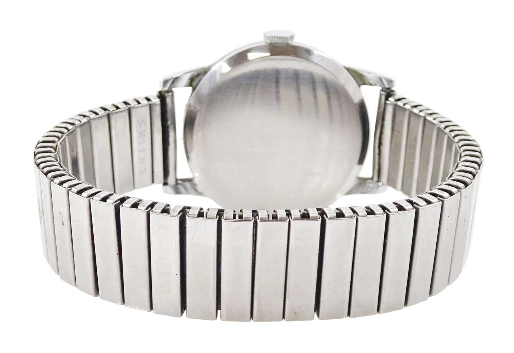 Tudor gentleman's stainless steel manual wind wristwatch, circa 1950's, Ref. 12856, silvered textured dial with Arabic hour markers and subsidiary seconds hands, back case signed Dennison for Rolex and numbered 12856 6545, on expanding stainless steel strap