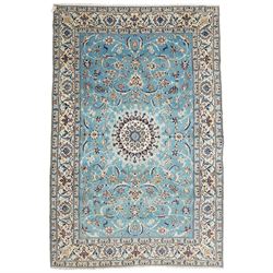 Central Persian Nain hand-knotted carpet, soft sky blue ground with central cusped medalli...