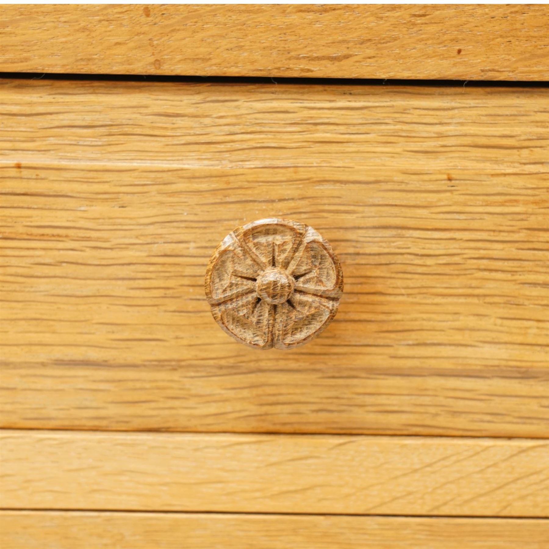 Beaverman - 1980s adzed oak sideboard raised on a trestle base, three drawers over three cupboards with Yorkshire Rose carved handles, fielded panelled sides and front, with carved Beaver, by Colin Almack of Sutton near Thirsk