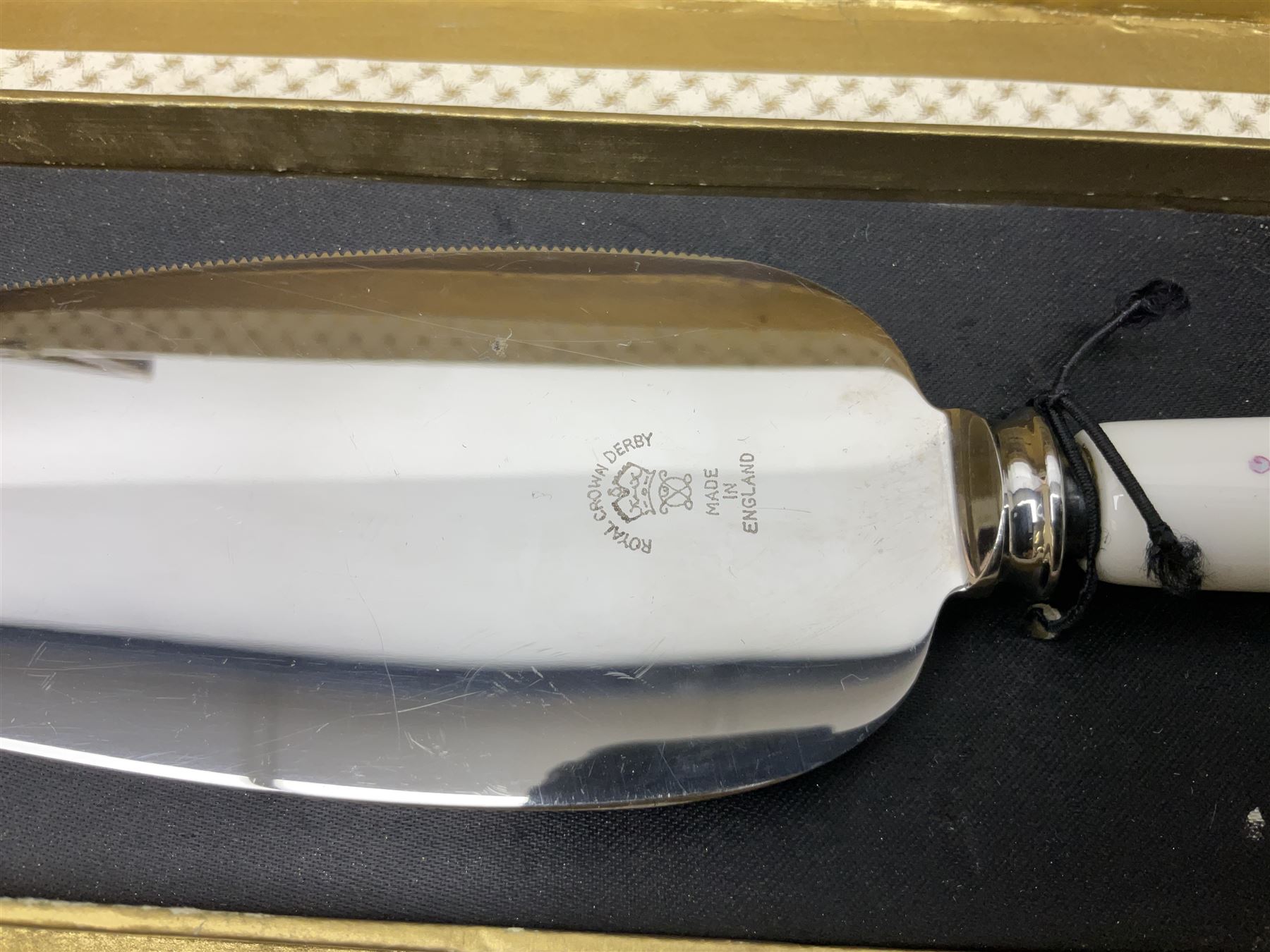 Collection of silver-plated cutlery including cased set of six EPNS cake forks, Royal Crown Derby pie server, sugar tongs, ladles, etc