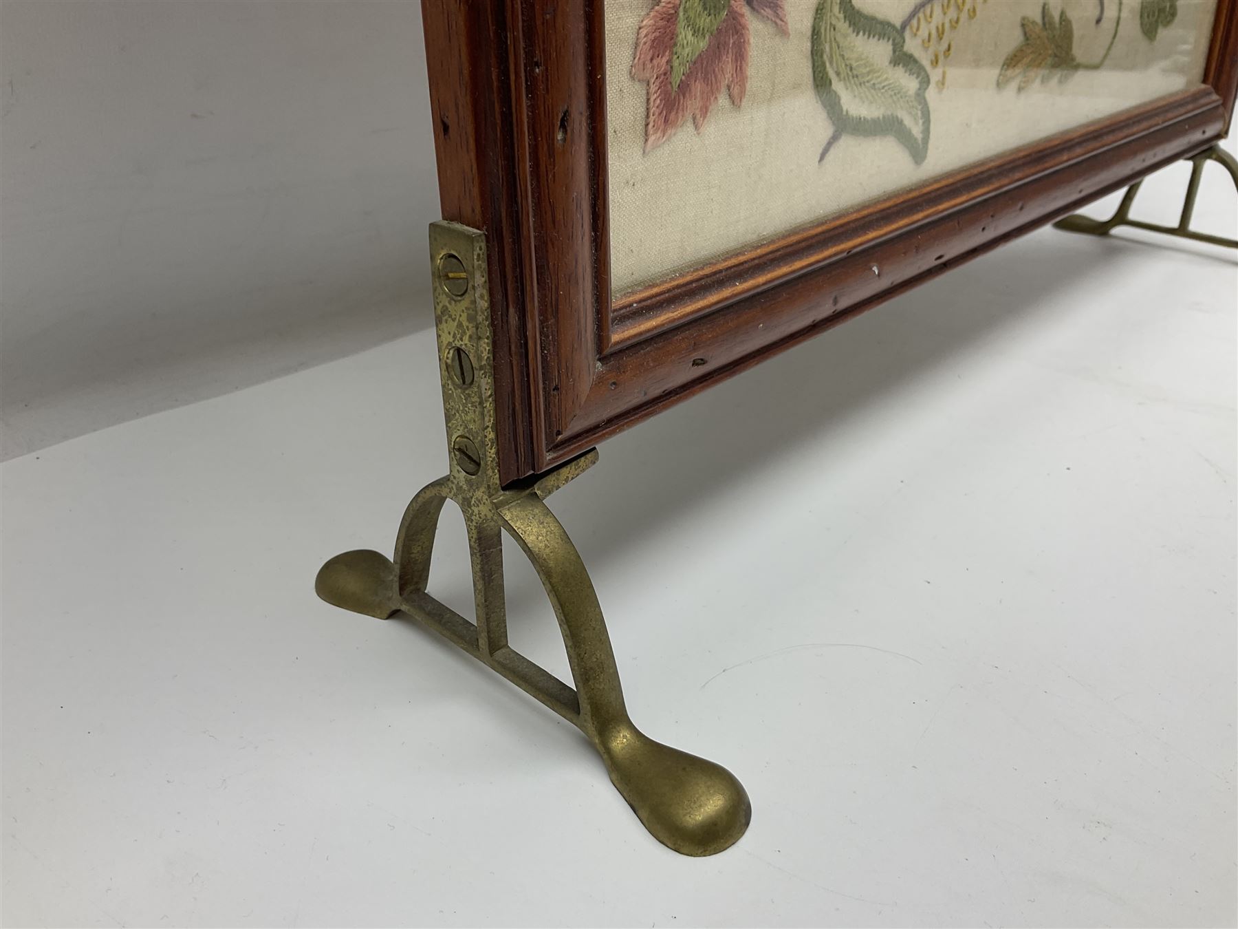 Two 1950s tapestries, the framed example celebrating the 1953 coronation, the second converted into a fire screen depicting a floral display, firescreen H70cm (2)