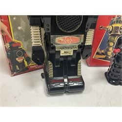 Three vintage battery operated robots comprising tin-plate Space Walk Man ME 100 Robot, Saturn the 13