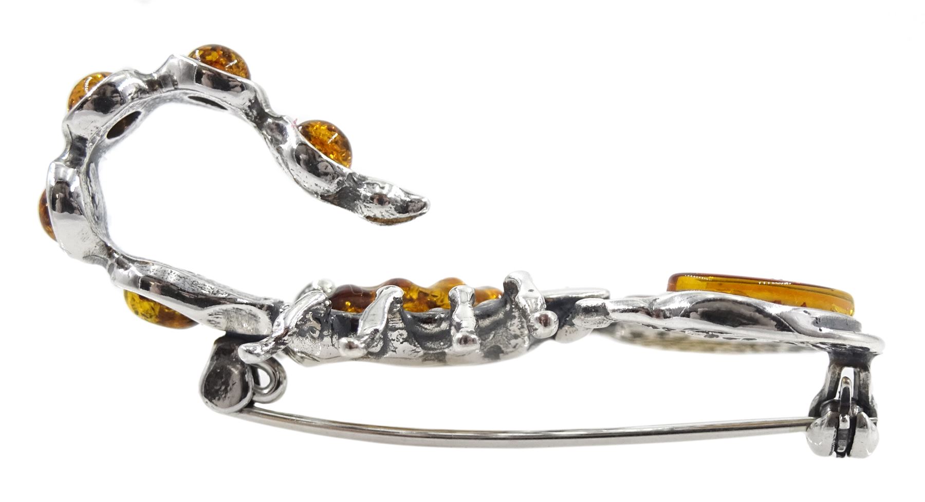 Silver amber scorpion brooch