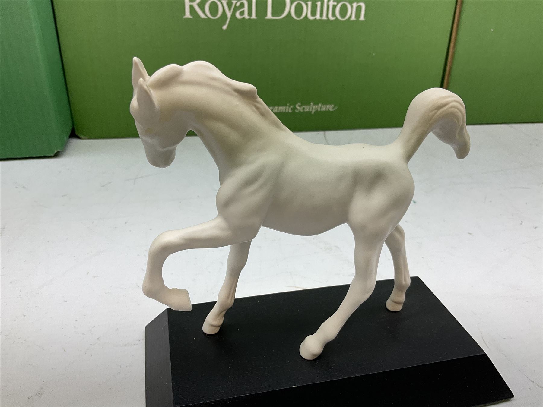 Five Beswick and Royal Doulton horse figures in matt white on black plinths, comprising of  Spirit of Affection no. 2689/2536, Springtime no.2837, Spirit of peace no.2916, Spirit of earth no.2914 and Spirit of the wild no. 183, together with a composite figure of a horse (6)