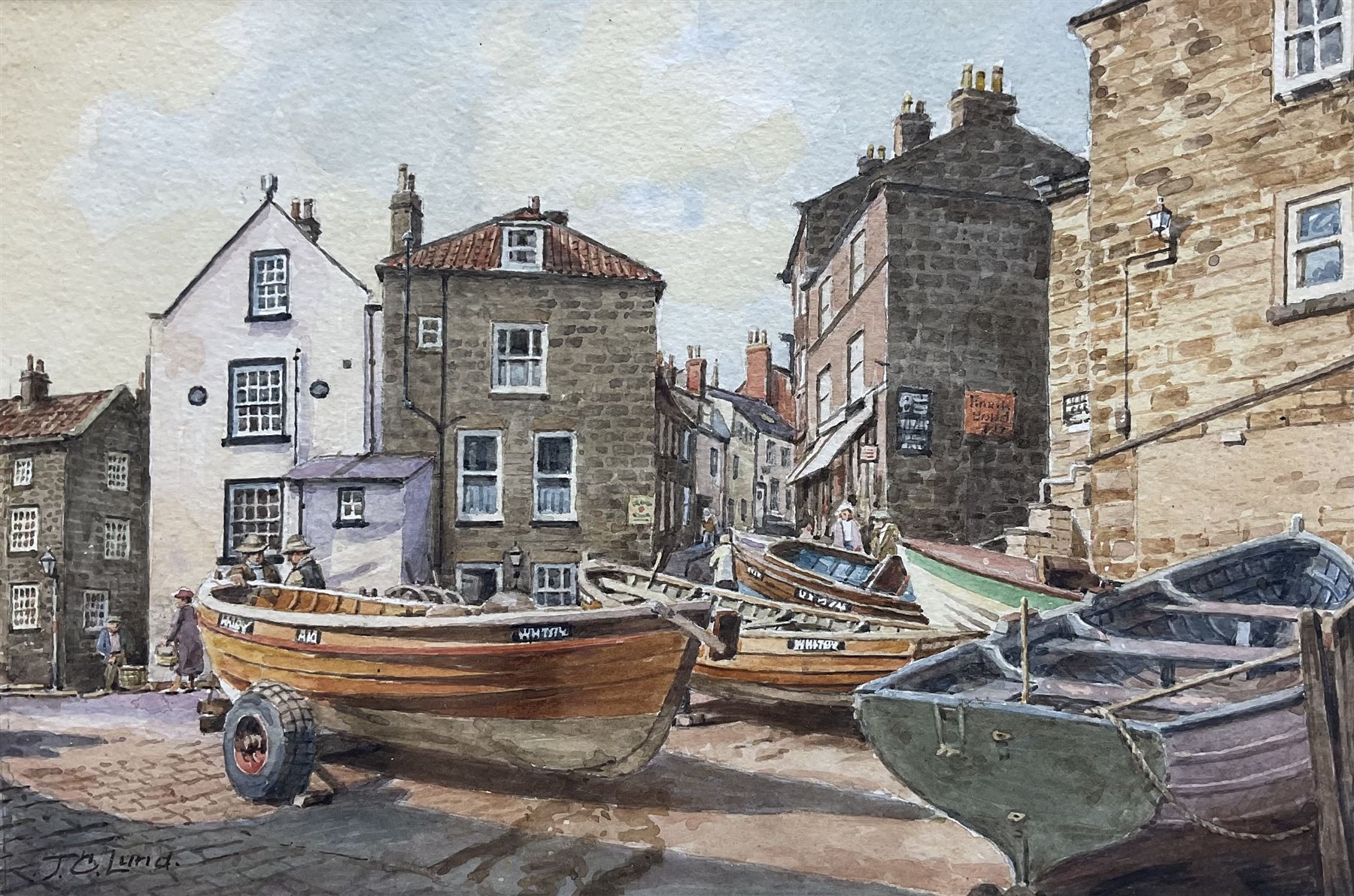 John Cecil Lund (British 1932-): Cobles at Robin Hood's Bay, watercolour signed 18cm x 27cm