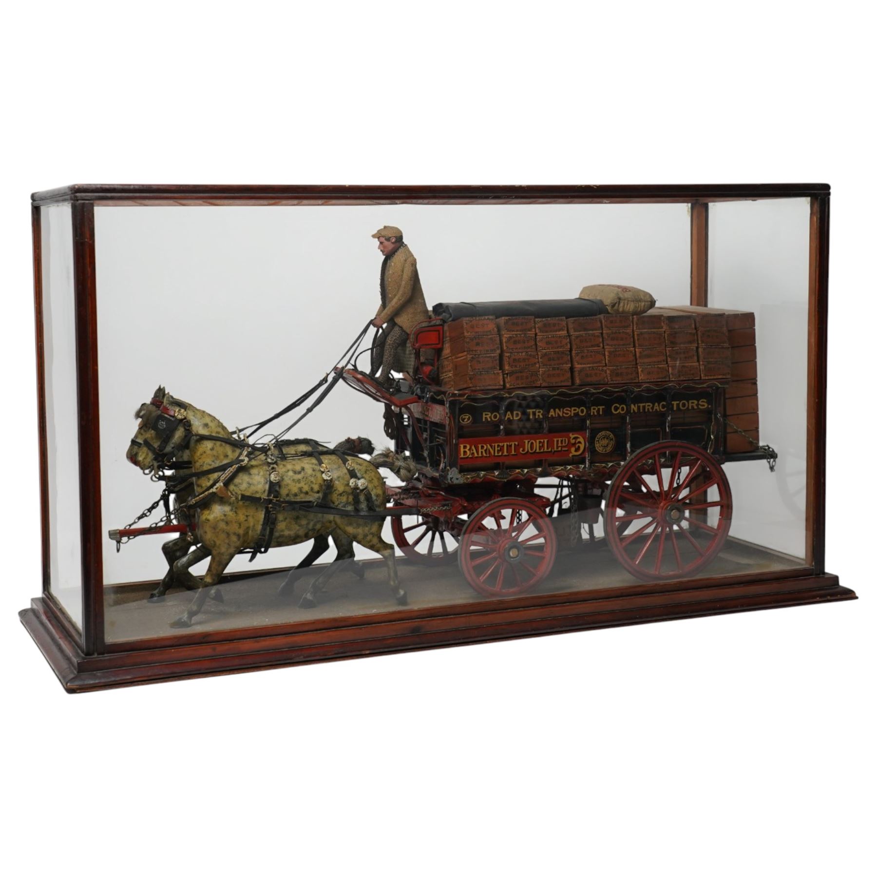 Victorian scratch built advertising model for Barnett Joel Ltd, by George Ivory  dated 1894, modelled as a horse drawn delivery wagon within a glazed display case, the hand painted cart laden with 'Best wick kippers' from various suppliers, pulled by two carved and dapple grey painted horses in full rig, upon a sanded base, with hand written makers label