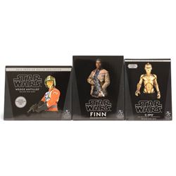 Four Gentle Giant Star Wars busts, comprising 2014 Premier Guild Exclusive Wedge Antilles Deluxe Mini Bust, 2013 Convention Exclusive C-3PO McQuarrie Concept, Finn and Preview Exclusive Chewbacca Mynock Hunt, together with a Master Replicas 501st Legion Clone Trooper Helmet Scaled Replica, all boxed