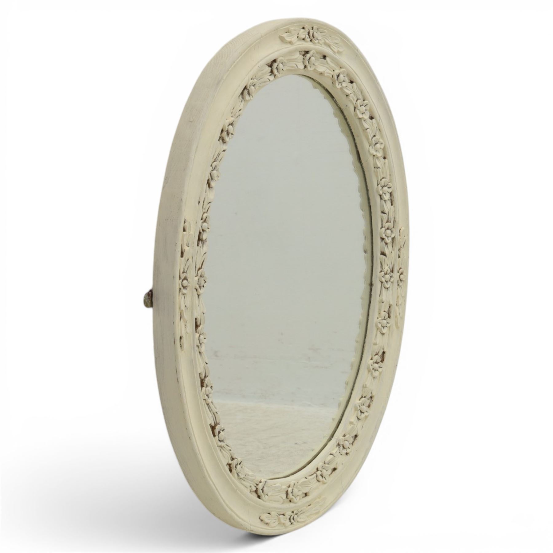 Oval painted pine wall mirror, with carved stepped edge, with mounts for hanging