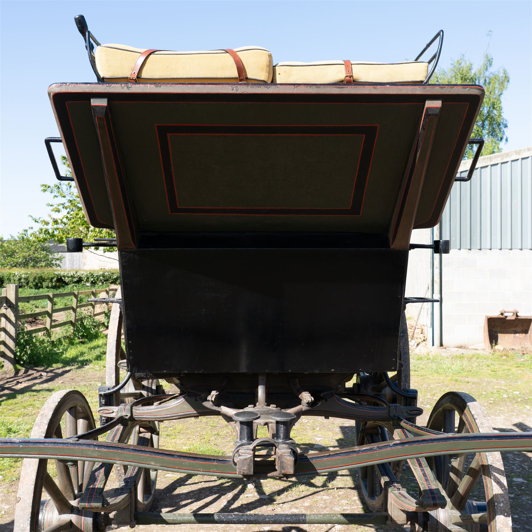 The Zetland Body Break by Peters & Sons, London

A fine and substantial late nineteenth century body break by Peters & Sons of London, circa 1880, formerly owned by the Marquis of Zetland. The carriage is finished in dark olive green and black with red, black and yellow lining, and is fitted with an elevated coachman’s box seat above a forward luggage compartment. The open rear body is entered by side doors and arranged with opposing longitudinal passenger seating.

The carriage is mounted on English pattern wooden artillery wheels with iron tyres and is carried on full elliptic springs, with a transverse helper spring behind. The front axle is fitted with fifth wheel turntable steering. The rear passenger compartment has upholstered longitudinal side benches beneath padded back rails, with turned spindle upper panels to the side doors and rear handrails. The driver’s seat is upholstered in corded fabric and secured with leather retaining straps.

Details include shaped splinter bar and turntable, folding rear step below the door with leather covered interior handle, luggage rails to either side, pole fittings for use with a pair or team of horses, and a handbrake with brake blocks operating to both rear wheels. The wheel hubs are fitted with polished hub caps engraved “Peters & Sons, London”. The exterior retains small Zetland family crests to the side panels.

The carriage has been conserved by Woods of Fairbourne Carriages Ltd and is recorded as Lot 146 in The George Shaw Collection sale, 5 November 2003, where it was catalogued as The Zetland Body Break and described as having previously been owned by the Marquis of Zetland.

Features
• Peters & Sons, London coachbuilder’s hub caps
• Known as The Zetland Body Break
• Formerly owned by the Marquis of Zetland
• Circa 1880
• Conserved by Woods of Fairbourne Carriages
• Dark olive green and black bodywork with red, black and yellow lining
• Elevated coachman’s box seat
• Forward luggage compartment
• Open rear passenger body with side doors
• Opposing longitudinal passenger seating
• Turned spindle upper panels to the side doors
• Folding rear step with leather covered interior handle
• Full elliptic spring suspension with transverse helper spring behind
• Fifth wheel turntable steering
• Handbrake with brake blocks operating to both rear wheels
• Wooden artillery pattern wheels with iron tyres
• Shaped splinter bar and pole fittings for a pair or team of horses
• Small Zetland family crests to the side panels

Provenance
The George Shaw Collection, 5 November 2003, Lot 146. Previously owned by the Marquis of Zetland.

Conservation

Conserved by Woods of Fairbourne Carriages.

Dimensions:
Overall length: 310 cm
Width: 176 cm
Height: 226 cm

Front wheel diameter: 98 cm
Rear wheel diameter: 140 cm

Seating:
Driver's box seat: 2 persons

Rear passenger compartment: Two longitudinal benches accommodating approximately 8 to 10 passengers