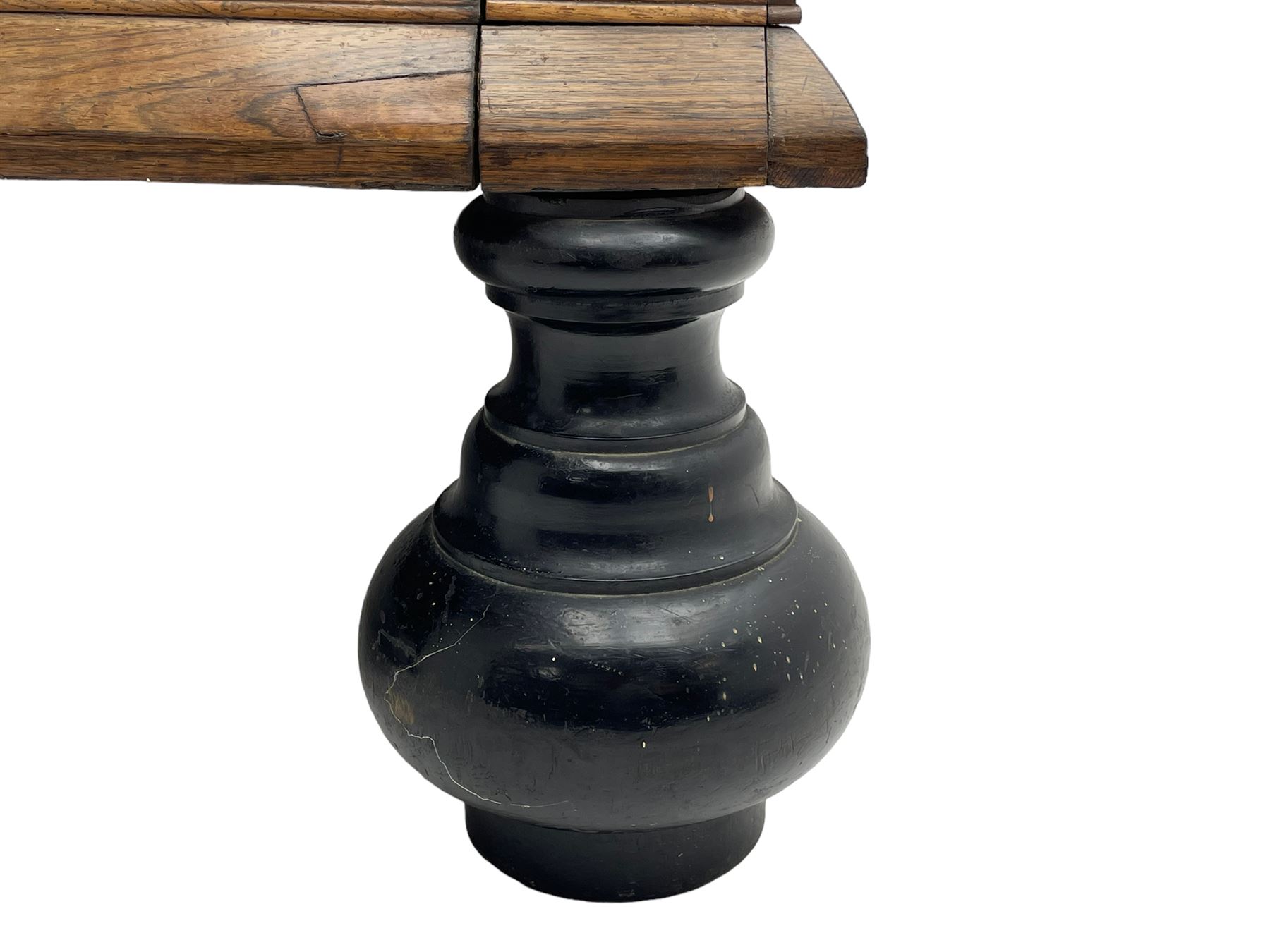 Late 17th century Flemish/Dutch rosewood and oak ‘Zeeuwse Kast’ or cupboard, projecting cornice carved with three putti masks, the uprights carved with lion masks over ribbons, flower heads and foliage, enclosed by four geometric panelled doors, lower central upright carved with flower head over foliate ribbon with bird among foliage, the escutcheon hidden by swivel berry carved cover, interior fitted with shelves, two drawers and shallow hinged cupboard, on two large turned and ebonised feet, circa 1680