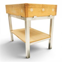 20th century butchers block kitchen island, solid top raised on stainless steel supports united by and undertier