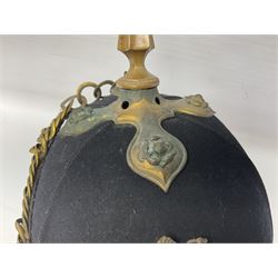 Victorian Officer’s blue cloth helmet, Home Service Pattern complete with gilt metal cross piece, removable spike and rose bosses supporting a velvet backed chin chain; gilt Royal Arms helmet plate to the front; interior retains leather sweatband and bears label for T. McBride & Sons 17 Charles Street Haymarket S.W.