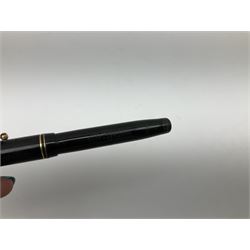 Vintage Swan Mabie Todd lever fill fountain pen in coral red, the nib a/f marked 14K, together with two further vintage Swan Mabie Todd fountain pens, the first example with lever fill, the other leverless, each with black body, one with nib marked 14ct, (3) 