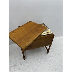 Large collection of Meccano, including perforated strips, wheels, cogs, nuts and bolts, various Meccano instruction manuals and magazines, all housed within a modified wooden box, with three tiered compartmentalised sections and upon four twist legs, box H60cm