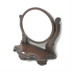 Victorian mahogany oval dressing table mirror, shaped base, W56cm, H54cm, D27cm