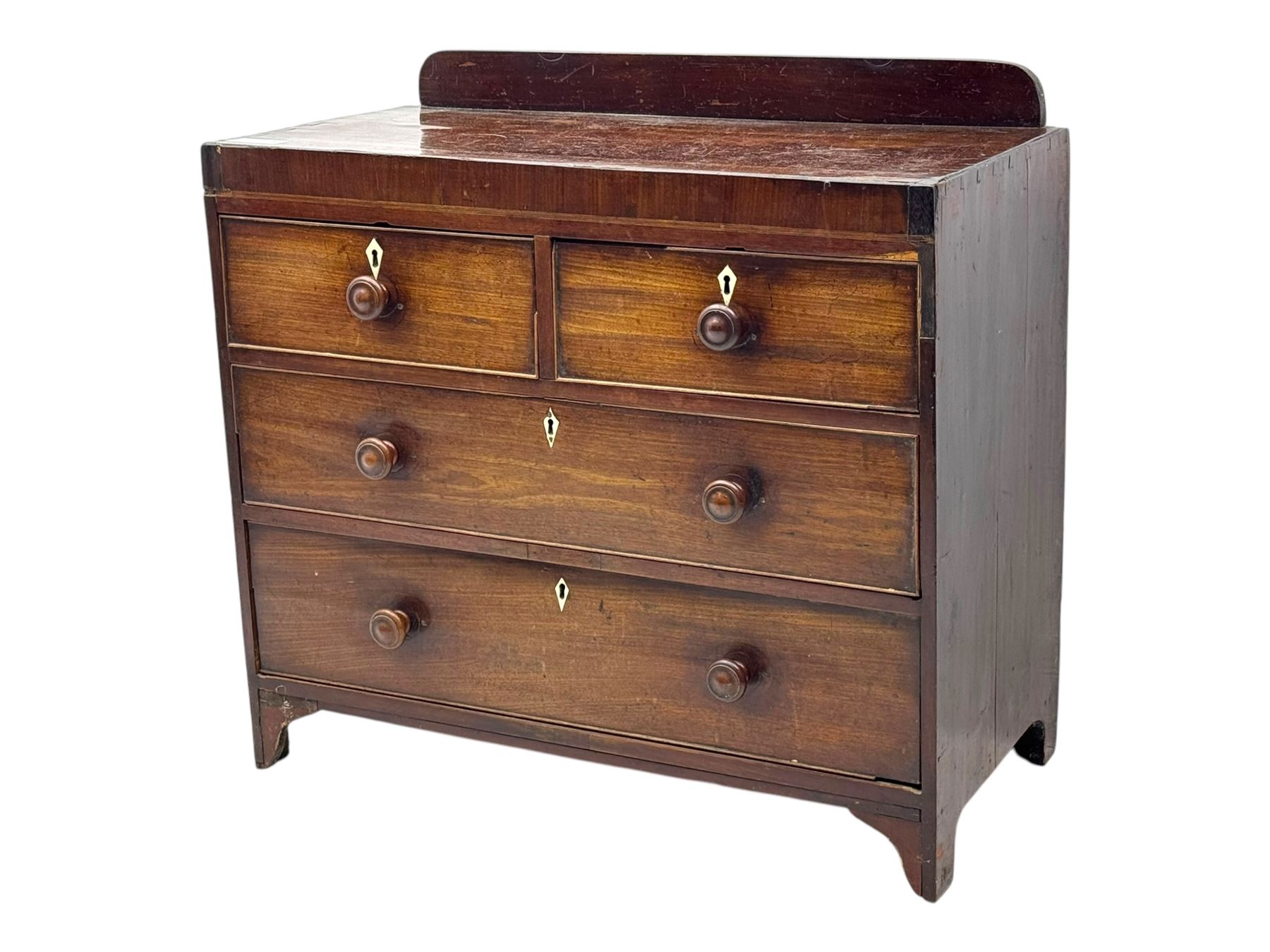 19th century mahogany chest, rectangular top with raised gallery back, fitted with two short and two long cockbeaded drawers, each with bone escutcheon, on shaped bracket feet
