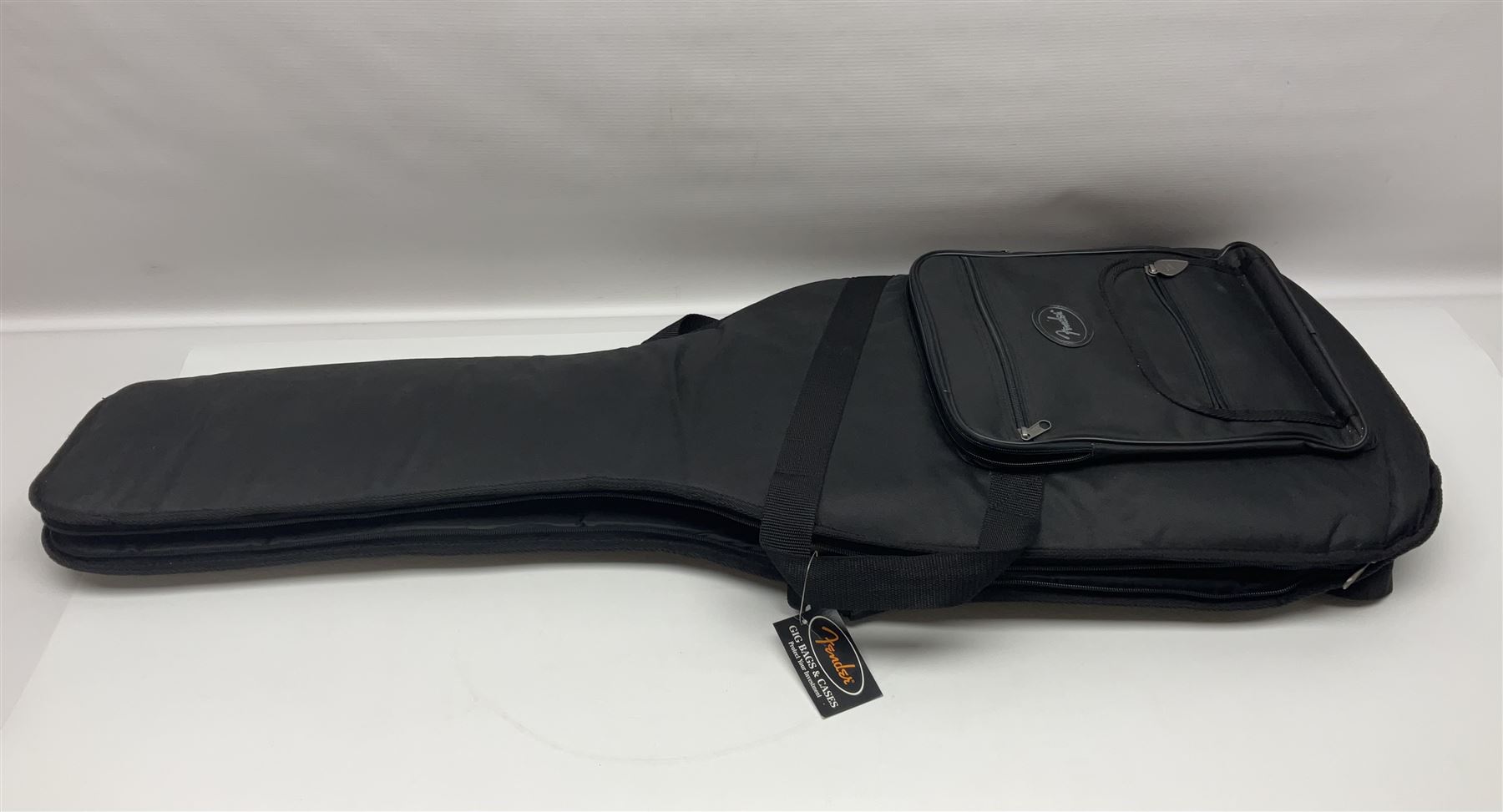 Mexican Fender Jaguar electric guitar with Humbucker pick-ups and tremolo arm, serial no.MX16741977, L101cm; in soft carrying case