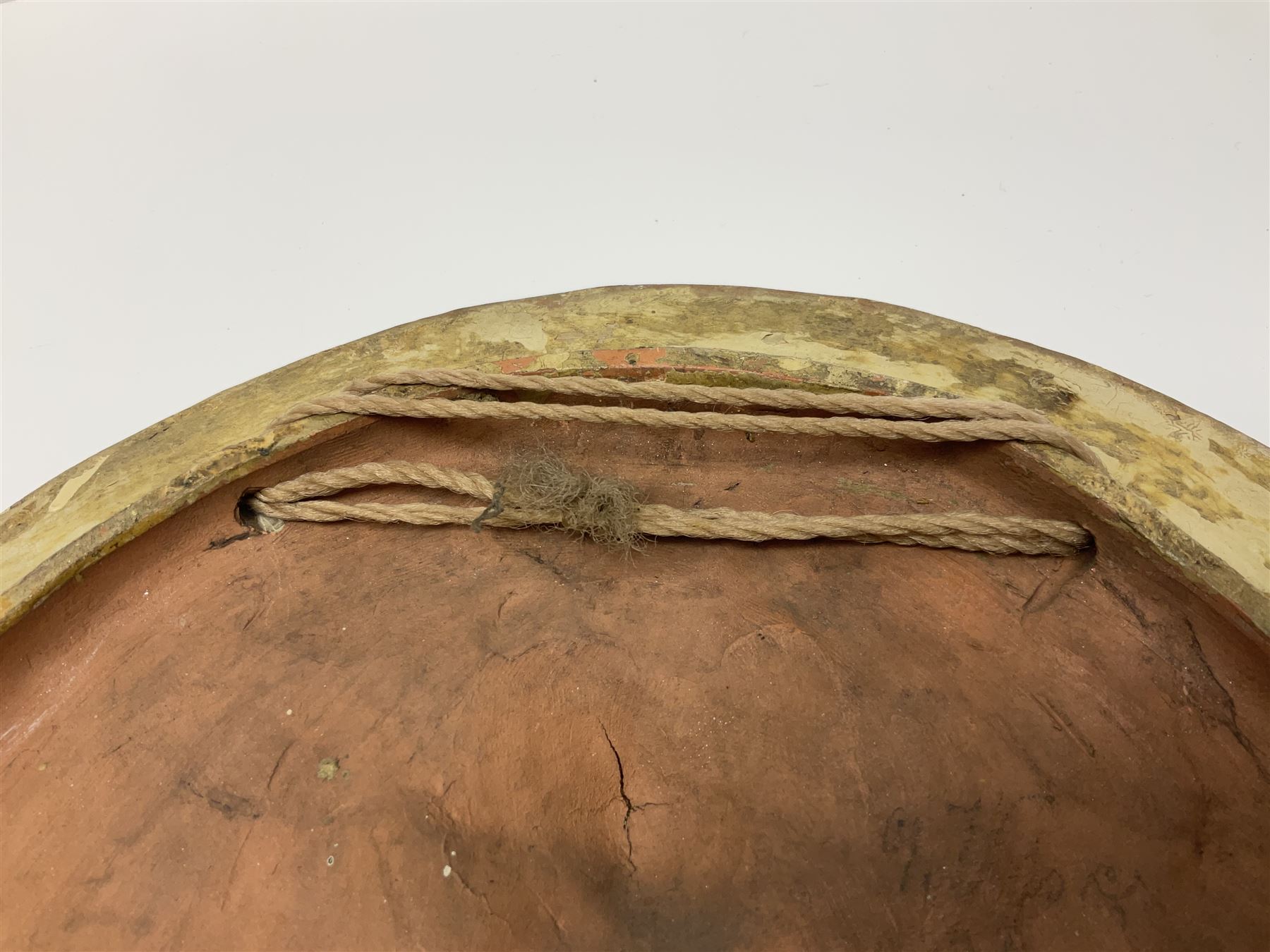 Pair of 19th century classical terracotta relief wall plaques depicting the goddess Hygeia and another goddess, seated holding an ewer, each of oval form, indistinctly signed, each stamped Ferreira verso, H42cm, W30cm