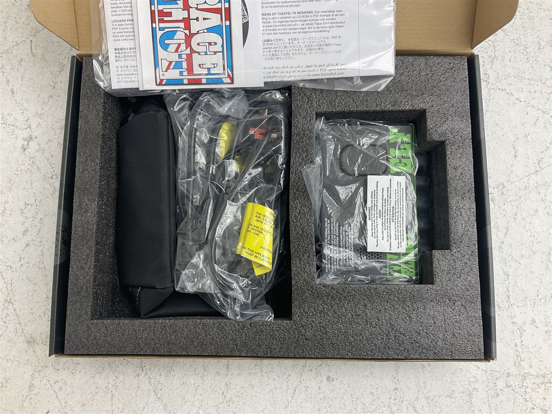 Trace Elliot ELF Ultra Compact Bass Amplifier; 200 watts; still in factory packaging and delivery box with paperwork; and Trace Elliot 10