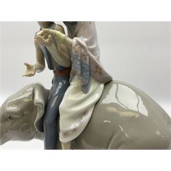 Lladro figure, Hindu Children, modelled as two children upon an elephant, no 5253, year issued 1986, H23.5cm