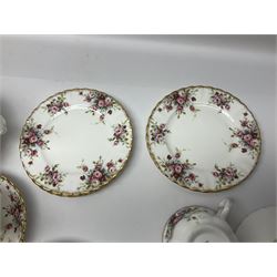 Royal Albert Cottage Garden pattern tea service for six people, comprising teapot, milk jug, sugar bowl, teacups and saucers, side plates and cake plate, all with printed mark beneath