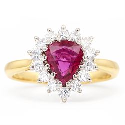 18ct gold ruby and diamond cluster ring, single pear cut ruby of approx 1.05 carat, surrou...
