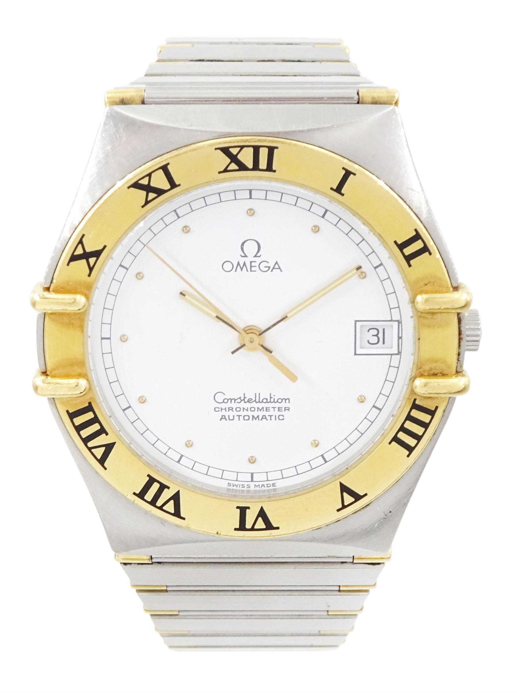 Omega Constellation gentleman's stainless steel and gold automatic chronometer wristwatch, Ref. Cal. 1111, serial No. 49547890, white dial with date aperture and exhibition back case, on integral bracelet No. 1448.5/431, with fold-over clasp
