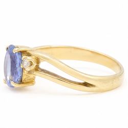 18ct gold sapphire and diamond three stone crossover ring, single oval cut sapphire of approx 1.15 carat, with a single cut diamond set either side, Birmingham 1991
