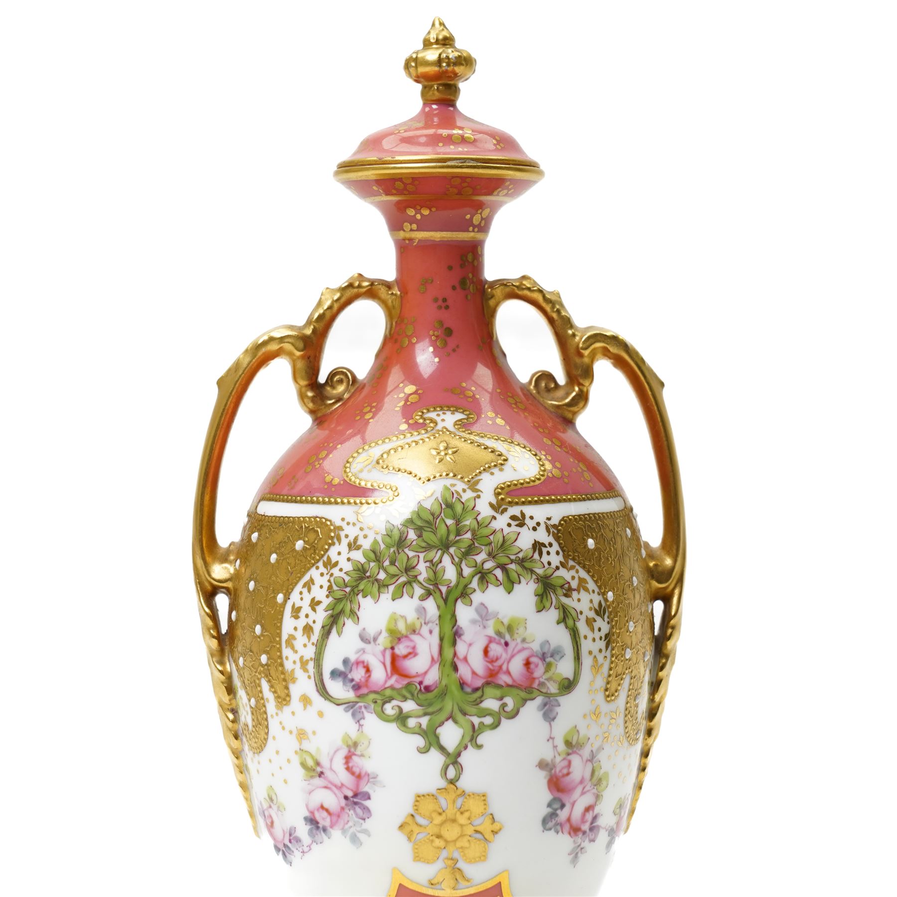 Early 20th century Royal Crown Derby vase and cover, of slender form, the pompadour pink ground with gilt decoration, painted centrally with a tree, printed marks to base, H25cm 