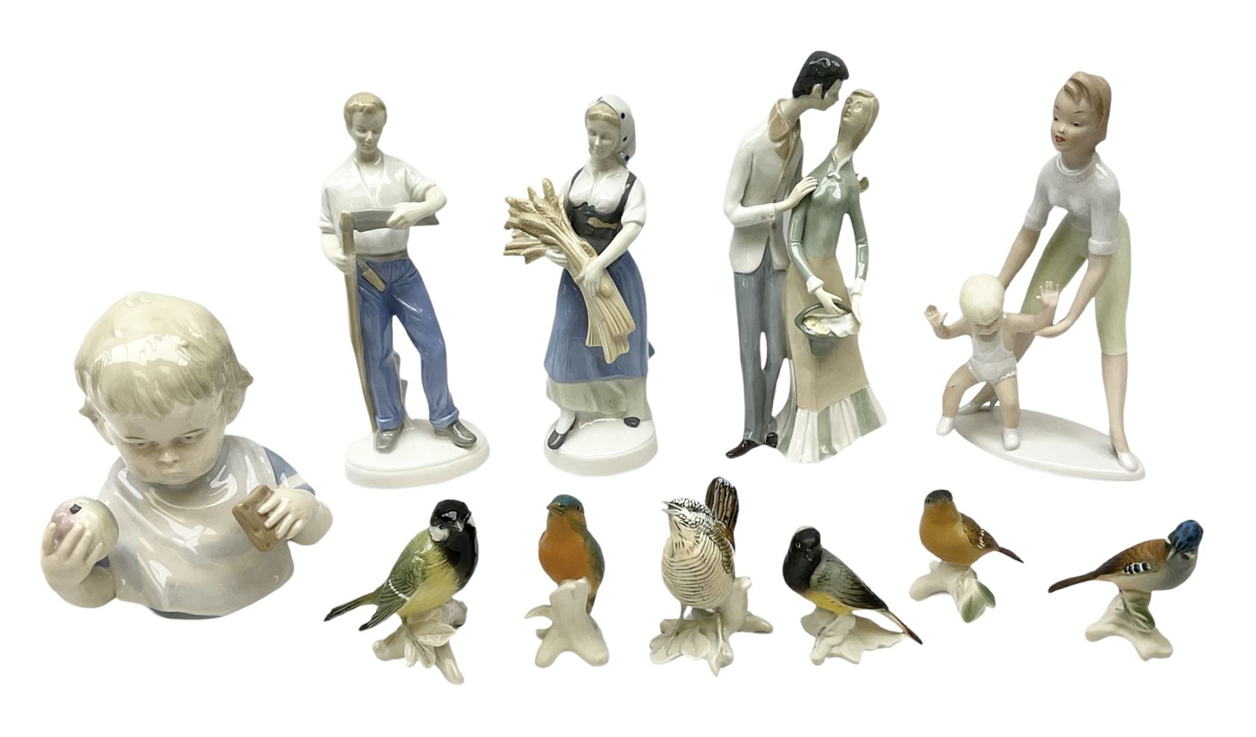 Six Karl Ens figures of birds, together with a Wallendorf figure of mother and child and four, Kunstporzellan bust of a baby and three other figure groups, tallest example H27cm
