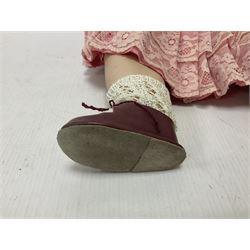 Reproduction Simon & Halbig bisque head doll with applied hair and jointed limbs; marked Simon & Halbig 117, H58cm