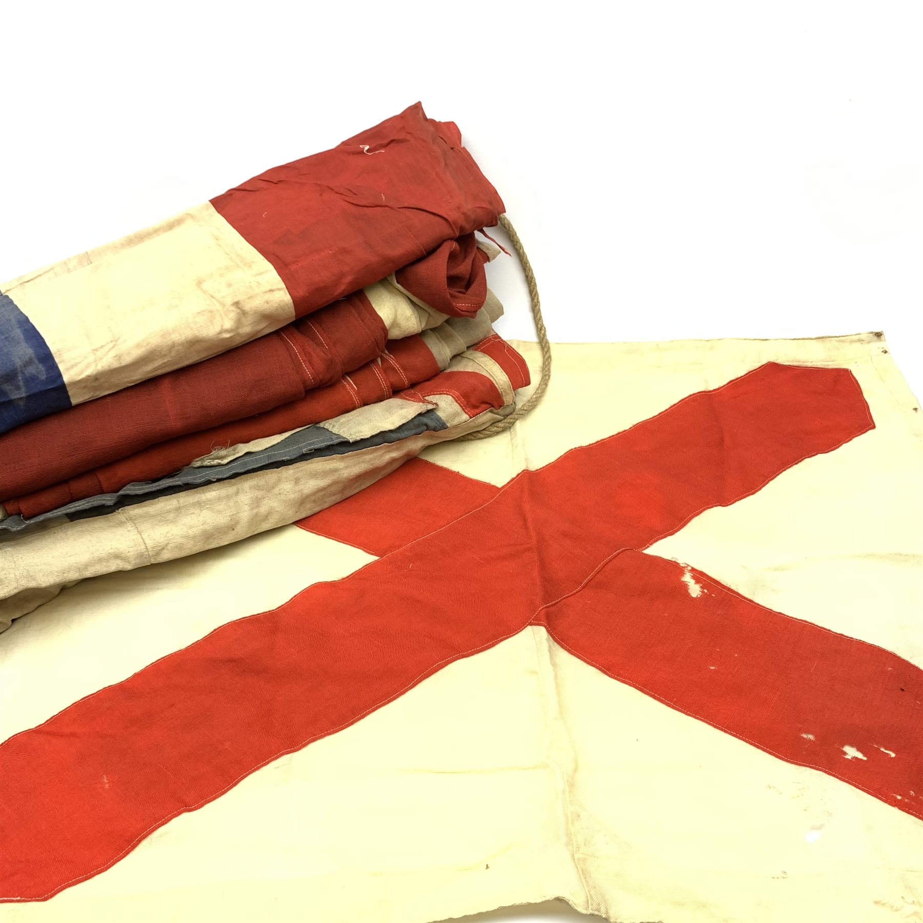 Thirty-seven various flags, pennants etc including Union flags, blue ensign, white ensign, Royal Standard, Scottish Rampant, Wales, Old Canada red ensign, Australia and New Zealand, France, Germany, South Africa (1928-94), semaphore and signal flags, 'God Save The King' banner, bunting flags etc