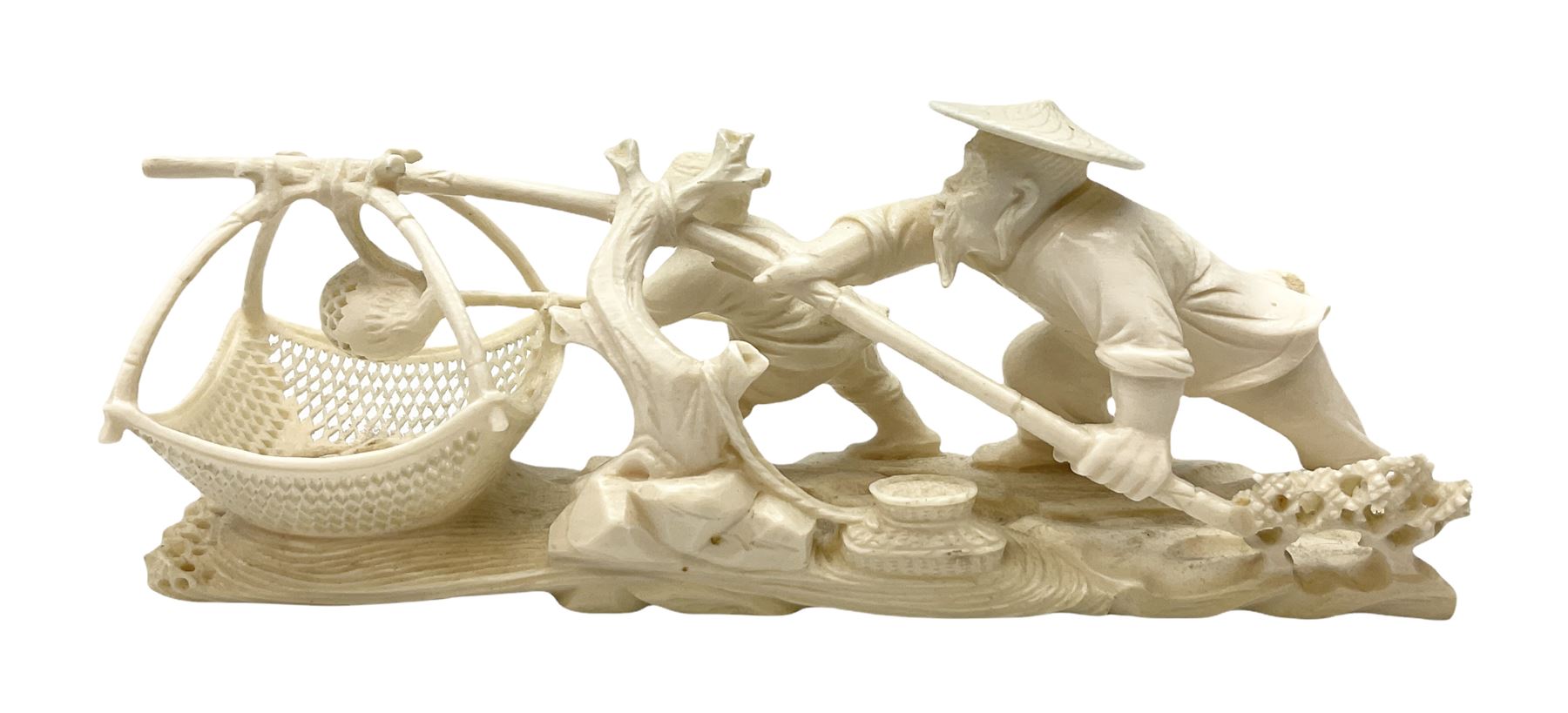 Japanese Tokyo School one piece ivory okimono, 19th century, carved as two fisherman with a net, H6cm, L15.5cm