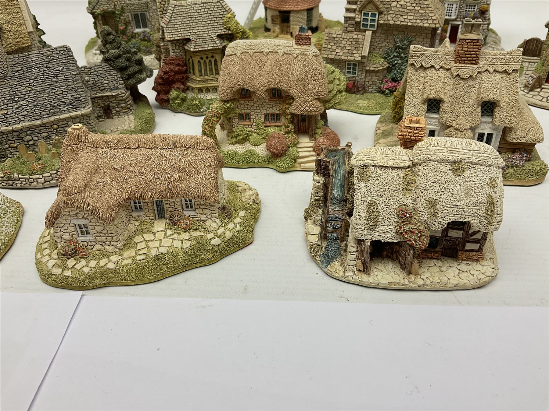 Twenty Lilliput Lanes, including The Chocolate House, Chiltern Mill, Blaise Hamlet, St Kevin Church, some with deeds and original boxes