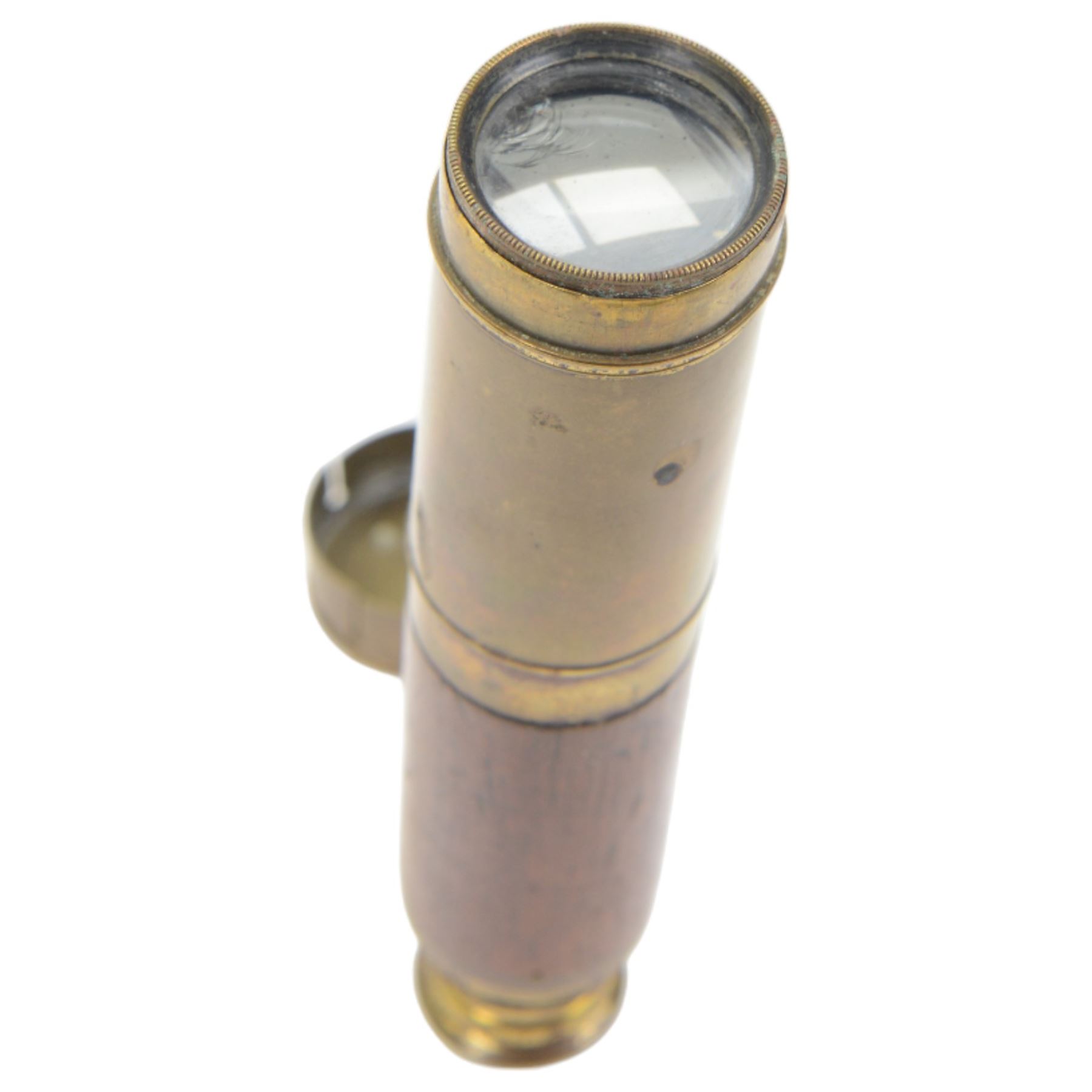 19th century mahogany and brass three drawer telescope, together with a larger leather bound telescope and a large circular metal bound magnifying glass