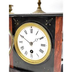French mantle clock c.1900 with two matching five light candelabra, eight-day timepiece movement housed in a rectangular flat topped Belgium slate case surmounted by a conforming slate and brass finial, contrasting marble inlay to the front with incised decoration, raised on four paw feet, 4” enamel dial, Roman numerals and minute markers, steel moon hands within a cast bezel with a flat bevelled glass. 
H41 W20 D13  Candelabra  H36


