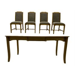 Windsor by Mark Devany oak rectangular extending dining table, with butterfly leaf, and four chairs with upholstered seats and backs