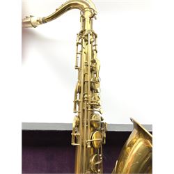 Brass tenor saxophone by Adolphe SAX, 84 Rue Myrha, Paris,  No.938 serial number 12097, H75cm excluding crook; in hard carrying case bearing plaque for Henri Selmer