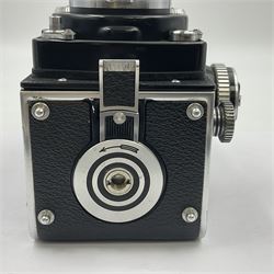 Rolleiflex Series E twin lens camera body, serial no. 1623867, with 'Planar 1.28 f-80mm' lens and 'Heidosmat 1:2.8/80' lens 