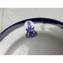 Collection of Regimental dinner wares, Comprising Royal Sussex; two dinner plates, two side plates and a soup bowl, Royal Leicestershire; two dinner plates, East Yorkshire Regiment side plate and Gordon Highlanders side plate, all decorated with the regiment's crests and blue and gilt boarders (9)