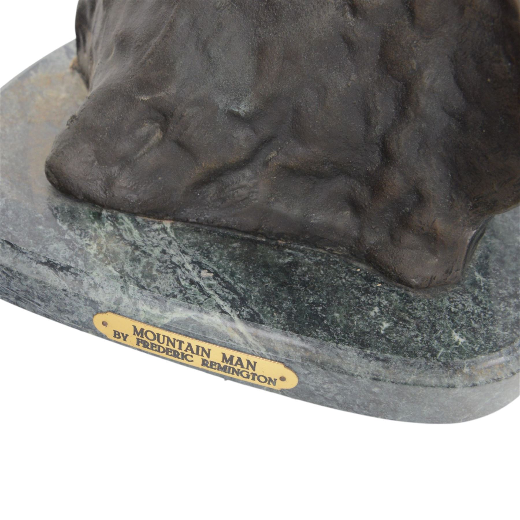 After Frederick Remington; The Mountain Man bronzed spelter figure of a native American trapper upon a marble base with plaque, H72cm